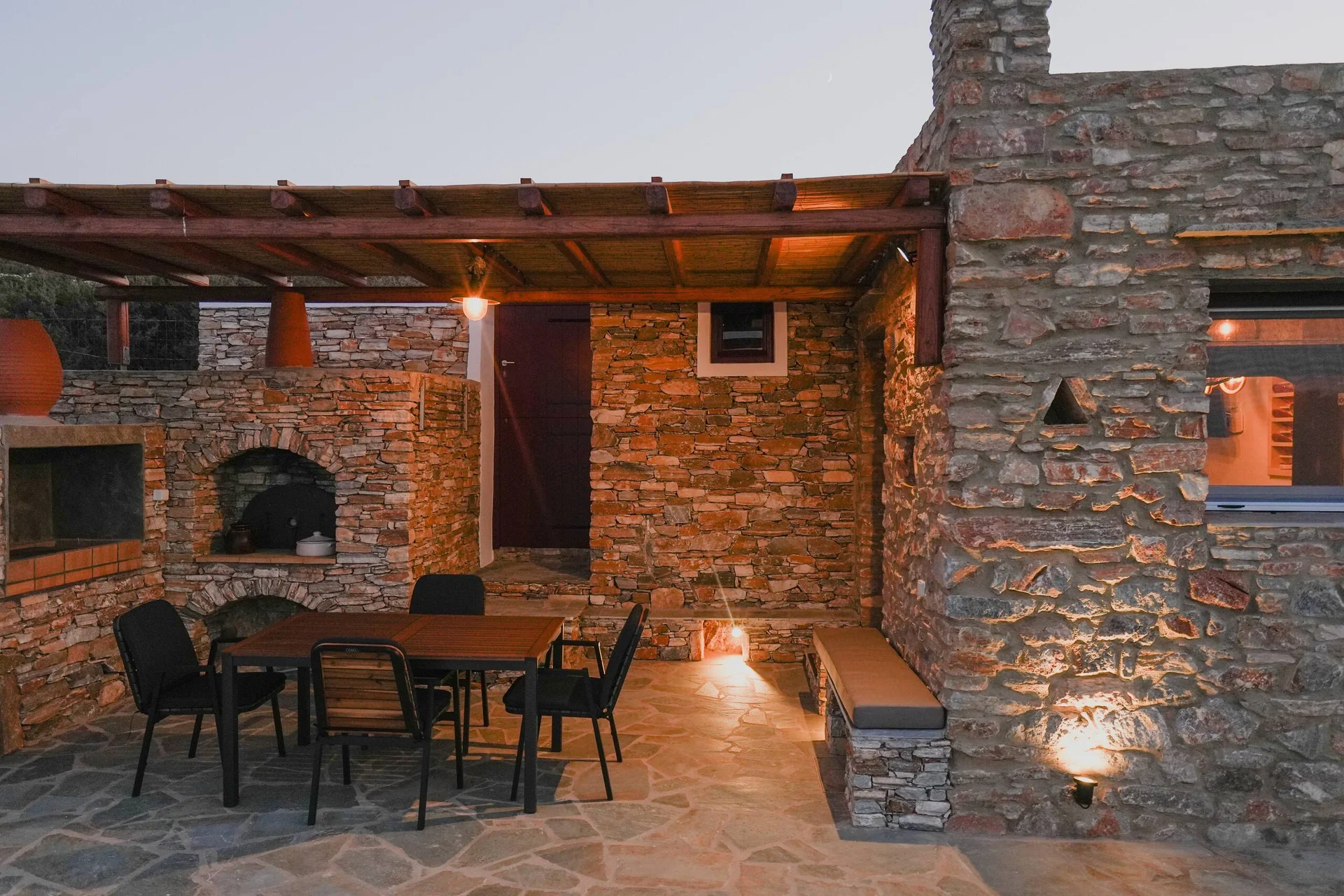 Onar Stone Villa pergola dining area